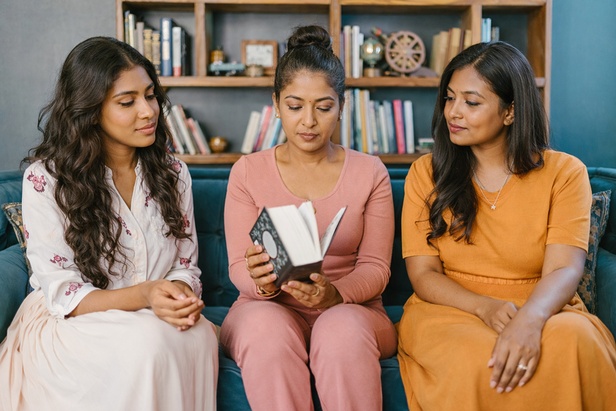three women discussing pcoc-education